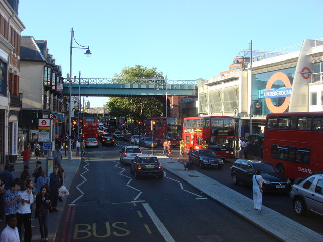 Brixton Road looking north, May 29, 2009, with the Underground station and South London Line bridge. Photograph: Oxyman, via Geograph and Wikimedia Commons; CC BY-SA 2.0.