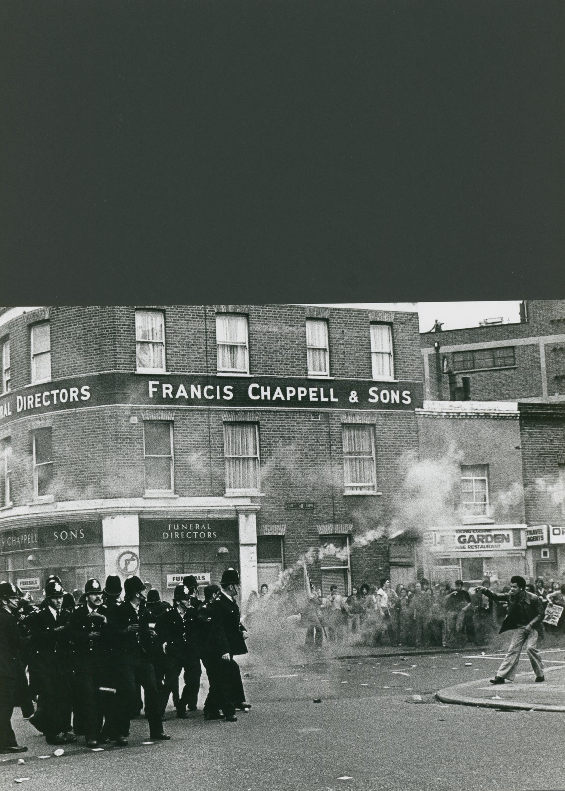 Police and demonstrators clash on Lewisham High Street, August 13, 1977. Photograph: Frank Duffin, digitized by John Duffin; Wikimedia Commons, CC BY 4.0. Resized for display; no other changes.